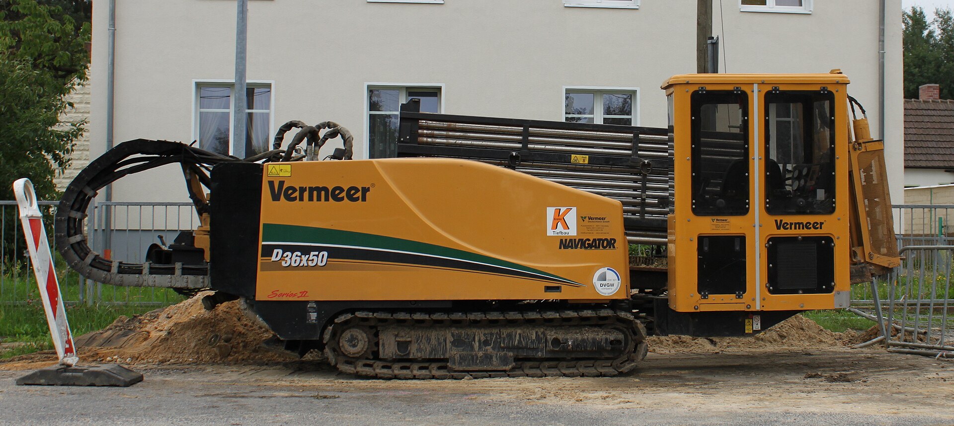 Vermeer D36x50 Navigator horizontal directional drilling machine on tracked chassis at underground utility construction site